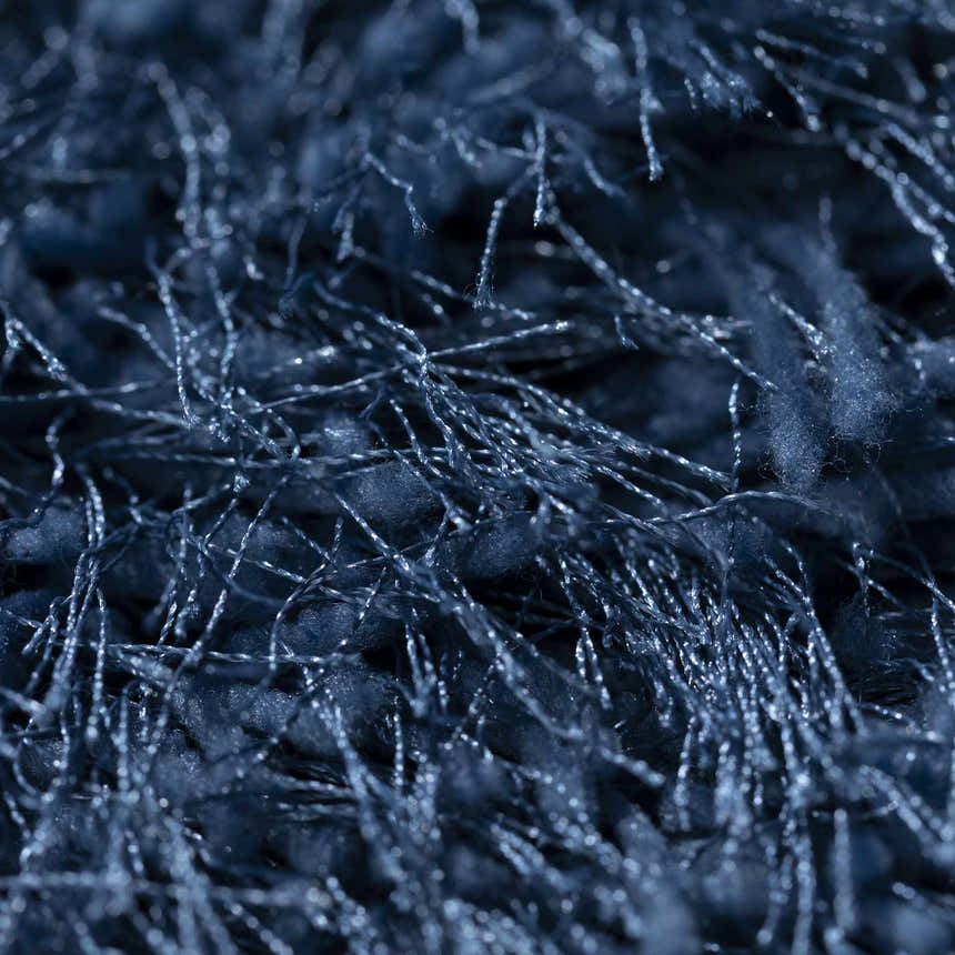 Close-up of the plush texture of the navy Dalyn Impact IA100 shag rug.
