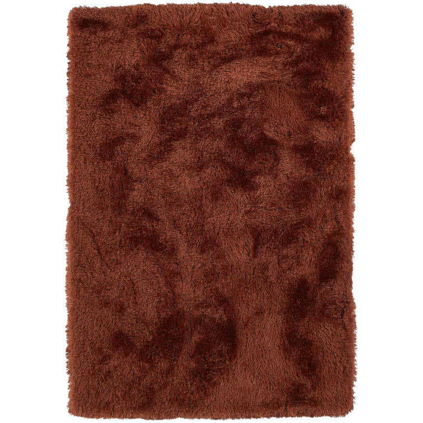 Close-up of the plush Dalyn Impact IA100 Paprika Area Rug. Shag texture in a rich, warm paprika color.