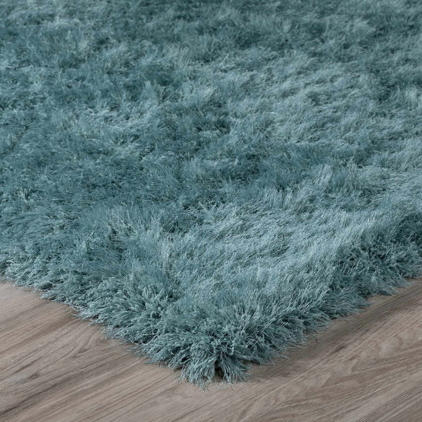 Close-up of the plush Dalyn Impact IA100 Teal Area Rug, a soft shag rug with a dense pile and subtle sheen.