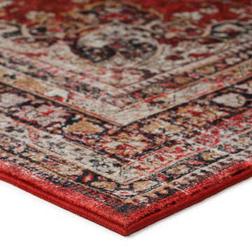 Close-up of Dalyn Jericho JC6 Garnet Area Rug showing red, gold, and brown traditional pattern and texture.