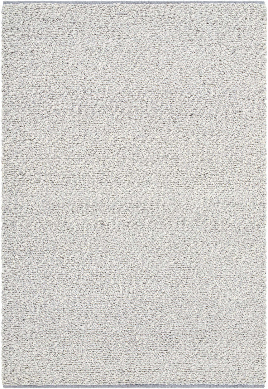 Close-up of the Wolven Ivory rug showing its chunky looped weave texture and neutral dove gray and ivory colors. Design-Rectangle-576