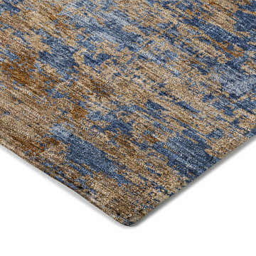 Close-up of the Dalyn Luxury Kochi KC2 Navy Area Rug, showing beige, brown, and denim blue textured pattern.