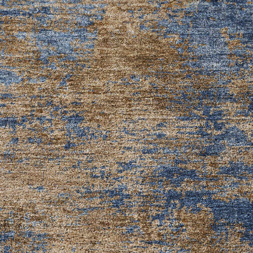 Close-up of Dalyn Luxury Kochi KC2 Navy Area Rug. Beige and blue abstract pattern. Farmhouse style.