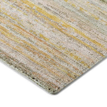 Close-up of the Dalyn Luxury Kochi KC3 Sage Area Rug. Beige, gold, and sage tones with a textured, machine-made design.