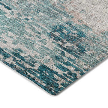 Close-up of the Dalyn Luxury Kochi KC4 Teal Area Rug, showcasing its teal, gray, and chestnut abstract pattern and soft texture.