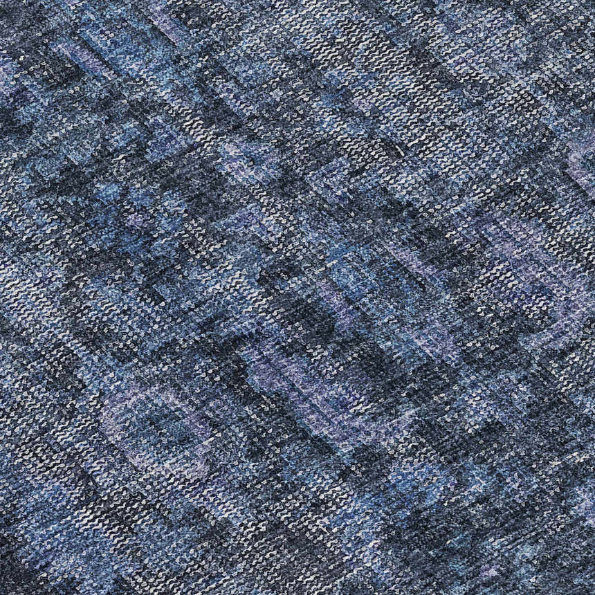 Close-up of the Dalyn Karaj KJ3 Blue Washable Area Rug, featuring a denim, light blue, and silver gray textured pattern.