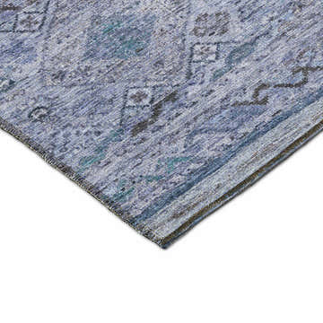 Close-up of the blue washable Dalyn Karaj KJ4 rug, showing its denim, light blue, and teal traditional pattern.