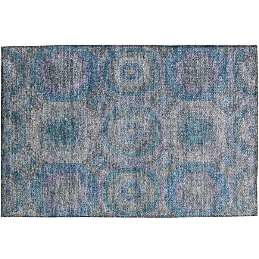 Close-up of the Dalyn Karaj KJ6 Blue Washable Area Rug. Features a traditional circle pattern in denim, light blue, and silver gray.