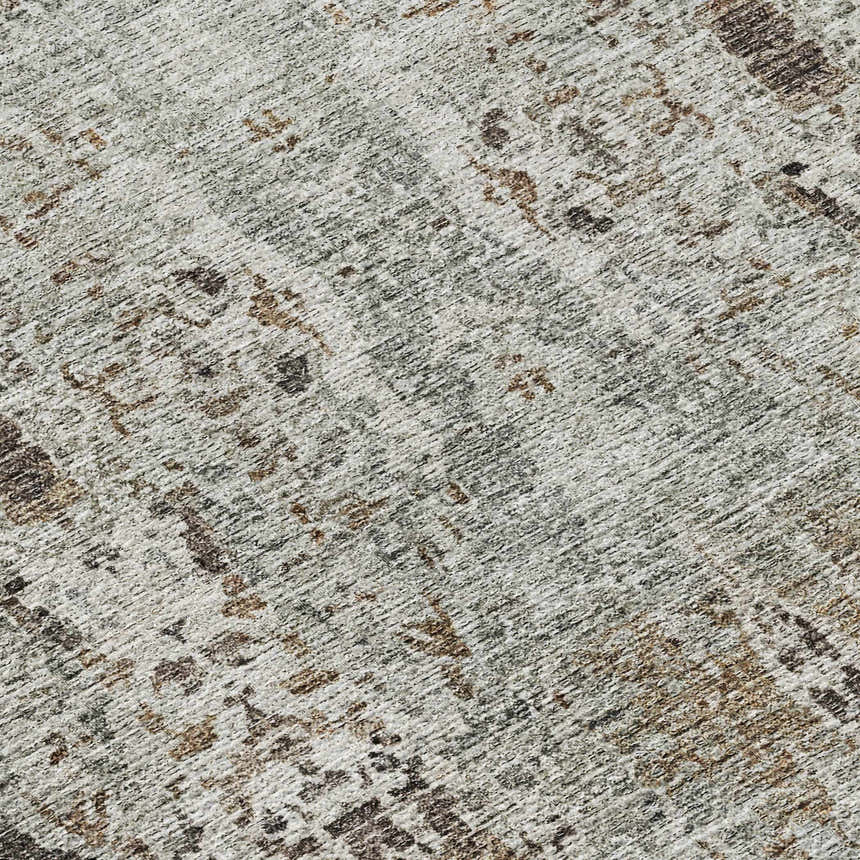 Close-up of the Dalyn Karaj KJ9 Linen Washable Area Rug. Beige, brown, and gray traditional pattern. Machine-made polyester rug.