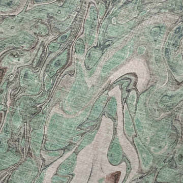 Close-up of Dalyn Kikiamo KK9 Seaside Washable Area Rug. Features a contemporary abstract pattern in sage, taupe, and teal.