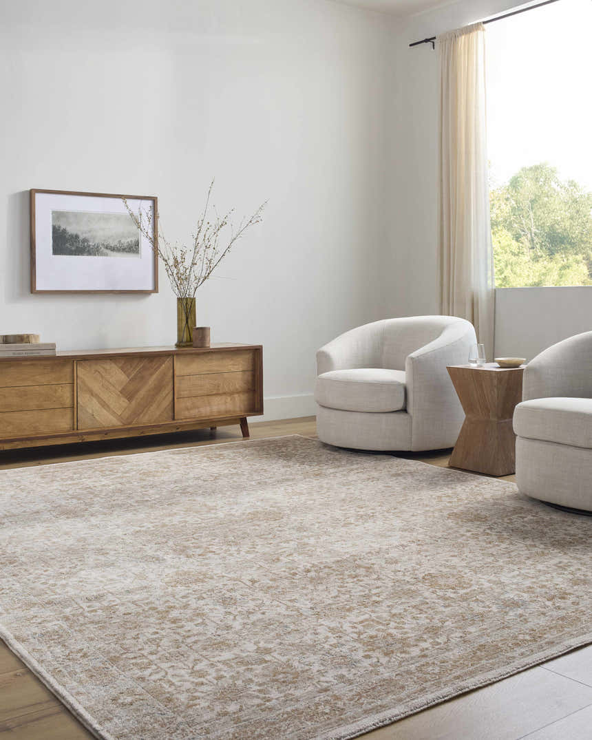 Living room scene with cream swivel chairs and the Andres Sage Area Rug. Roomscene-Rectangle