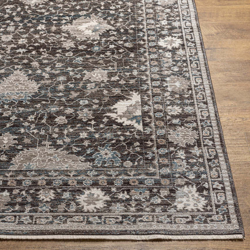 Close-up of the Linmansangan Area Rug showing its dark brown, ivory, and pale blue oriental design and machine-woven texture. Front