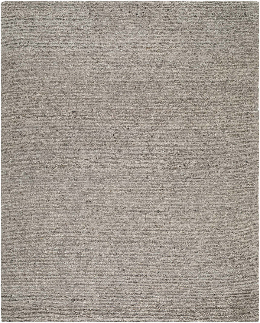 Close-up of the hand-tufted Winta Taupe Wool Area Rug, showing its gray, tan, and sage colors and textured wool and cotton blend. Design-Rectangle-810
