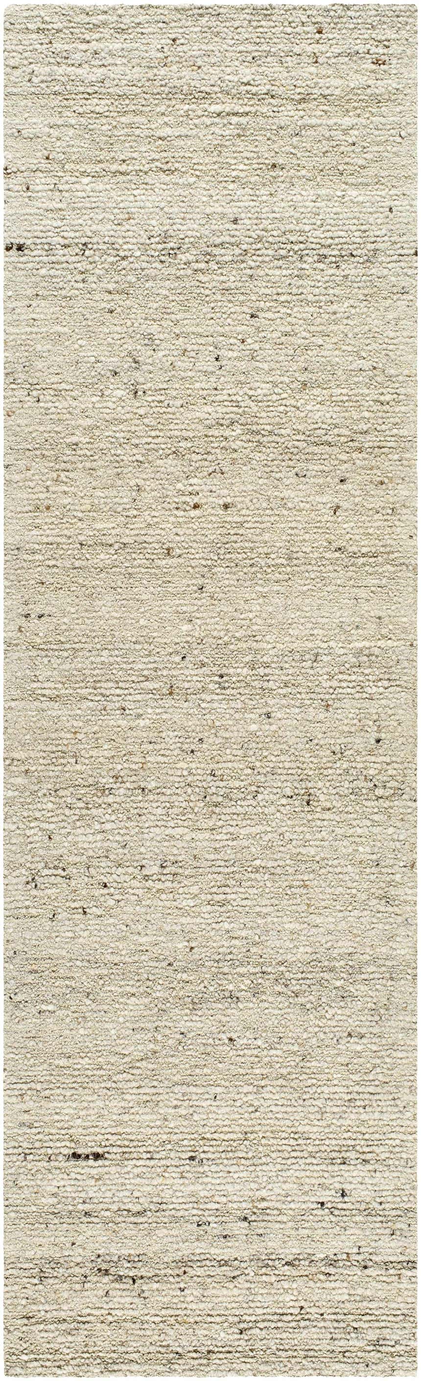 Close-up of the hand-tufted Winta Wool Area Rug. Ash, beige, and tan tones with a subtle, textured design. Design-Runner-310