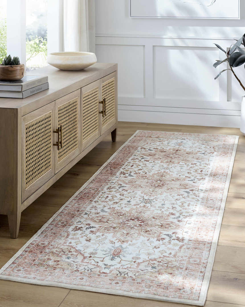 Living room scene with Lotan Pink Medallion Washable Area Rug runner. Light wood floors and cabinet. Farmhouse style. Roomscene-Runner