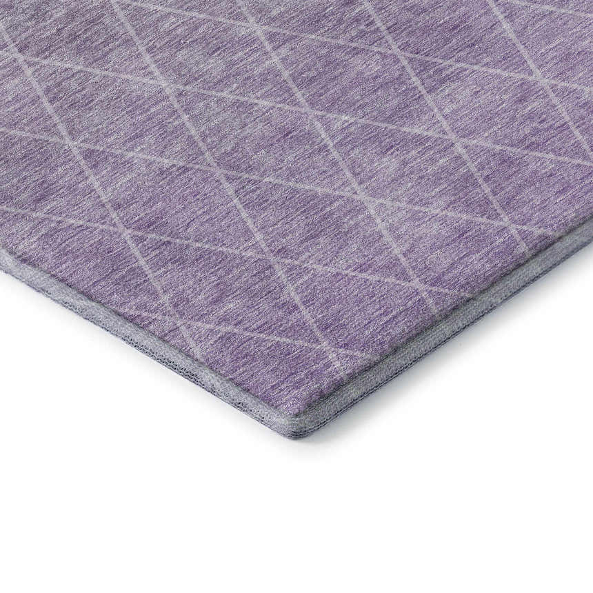 Close-up of the Dalyn Luxury Lazio LZ2 Lavender Washable Area Rug. Light purple rug with a subtle silver gray diamond pattern.