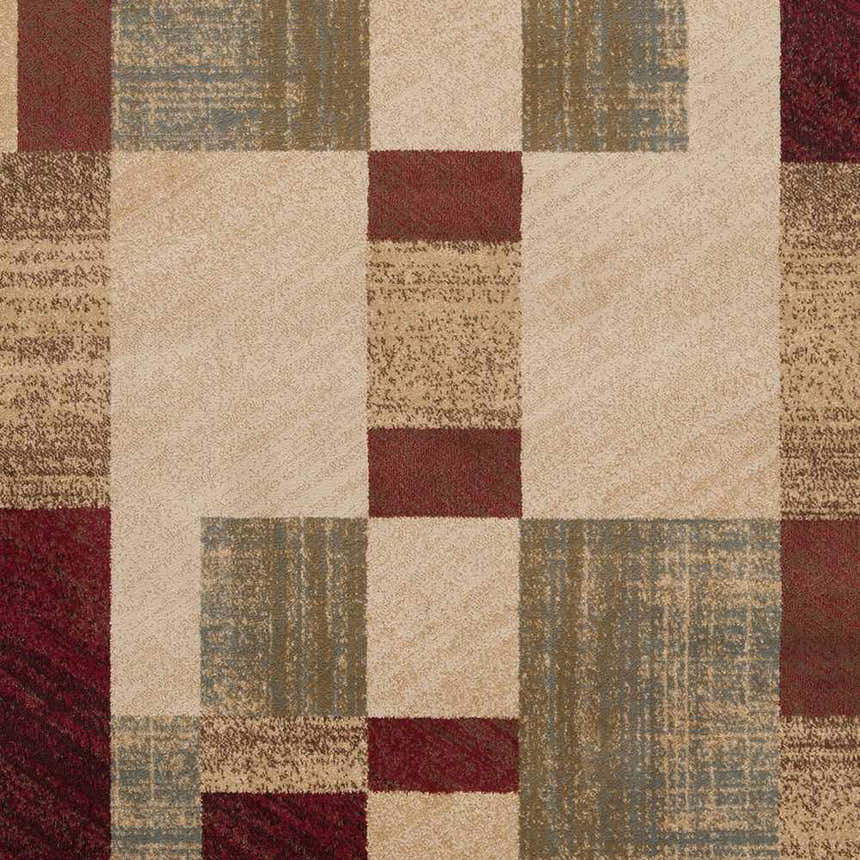 Close-up of the Maumee Brown Mosaic Performance Rug, featuring a geometric patchwork design in red, beige, brown, and olive tones. Swatch