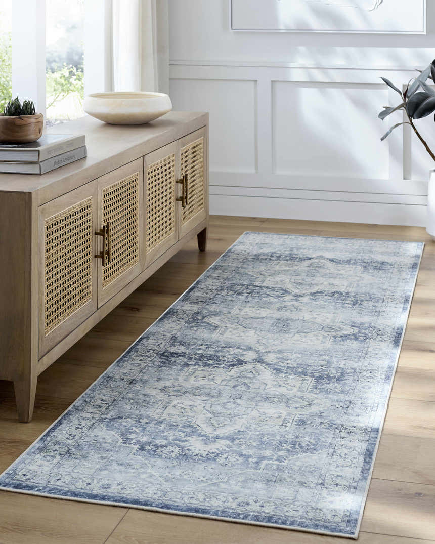 Entryway with light wood console and Mauro Navy Medallion Washable Area Rug runner in blue and gray. Roomscene-Runner