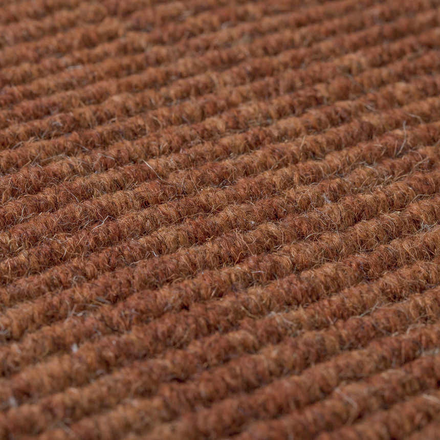 Close-up of the textured, hand-loomed Dalyn Monaco Sisal MC100 Paprika Area Rug in paprika red.