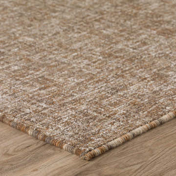 Close-up of the hand-tufted Dalyn Mateo ME1 Mocha Area Rug. Beige, brown, and off-white wool and viscose blend.