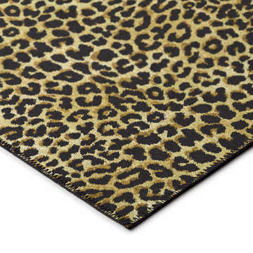 Close-up of Dalyn Mali ML2 Gold Washable Area Rug. Black and gold animal print pattern. Casual style.