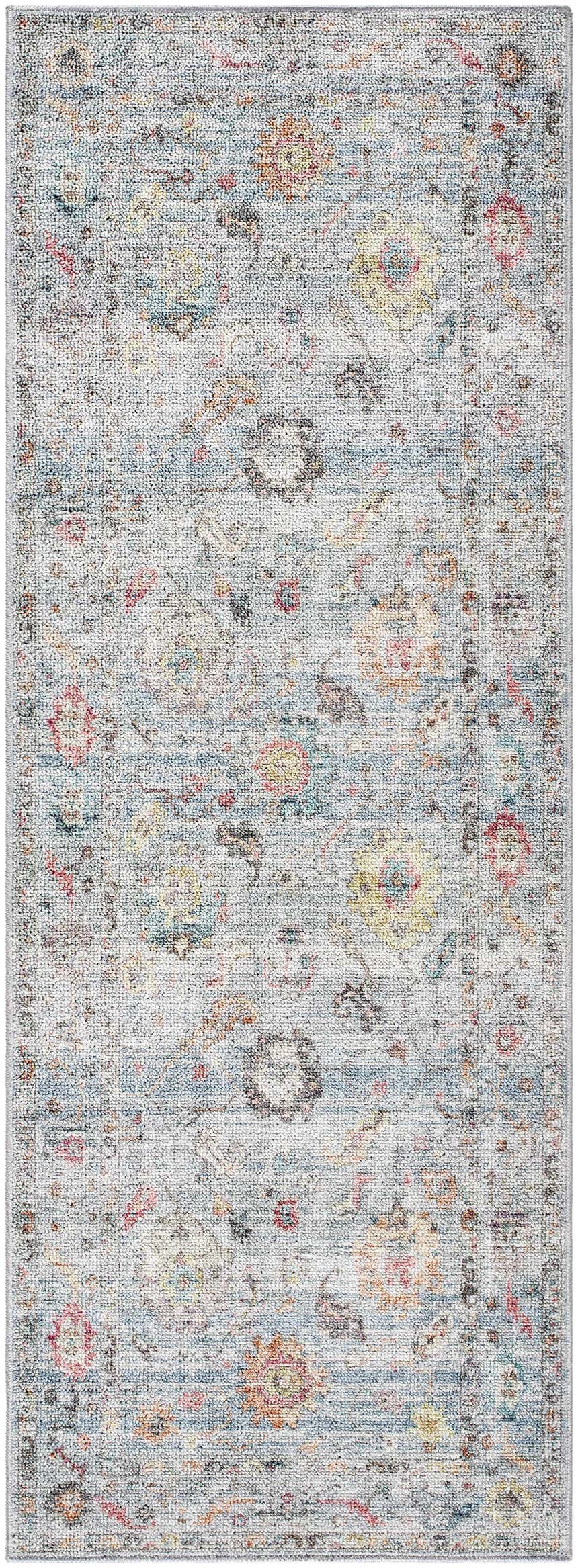 Close-up of the Maura Washable Area Rug, featuring a traditional floral pattern in aqua, orange, and gray hues. Design-Runner-2773