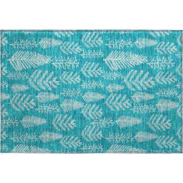 Close-up of Dalyn Luxury Merry & Bright Teal Washable Area Rug with a white pine tree pattern. Holiday style.