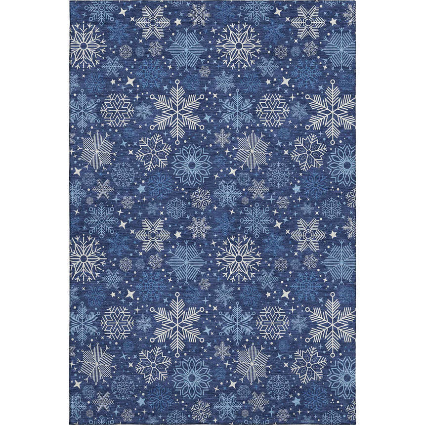Close-up of Dalyn Luxury Merry & Bright MY25 Navy Washable Area Rug featuring a snowflake and star pattern.