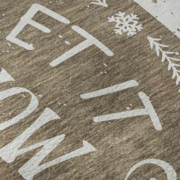 Close-up of the Dalyn Luxury Merry & Bright MY7 Beige Washable Area Rug featuring a holiday-themed design.