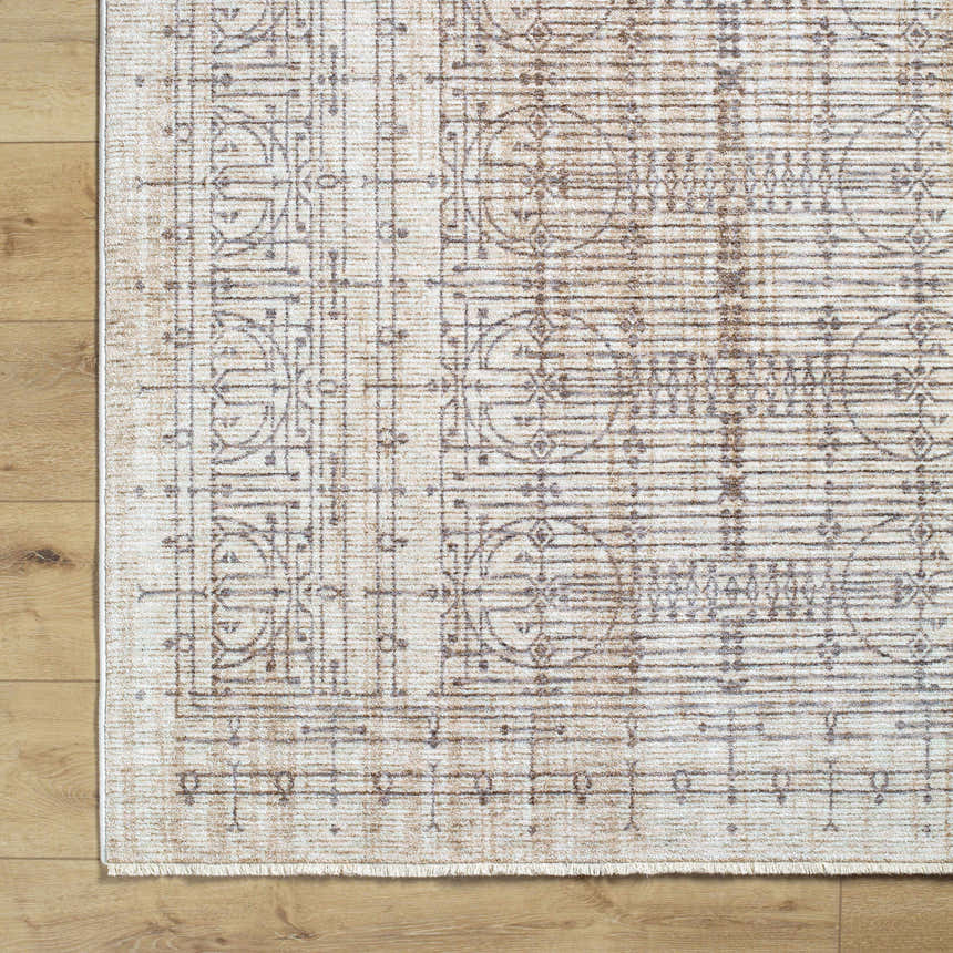 Close-up of the Usonia USO-2304 area rug. Machine woven polyester rug in dark red, gray, and white with a contemporary design. Corner