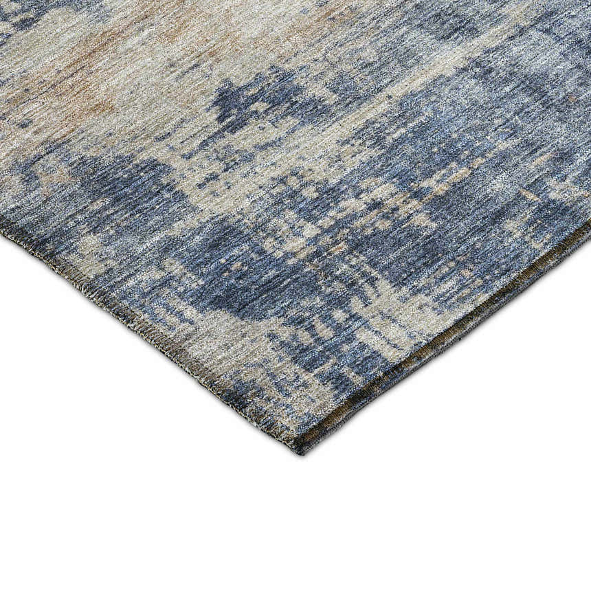Close up of Dalyn Nouveau NV25 Denim Washable Area Rug. Beige, denim, and light blue abstract pattern.