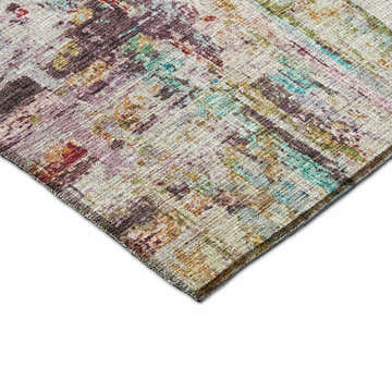 Close-up of Dalyn Nouveau NV2 Lavender Washable Area Rug, showing beige, purple, teal, and green contemporary design.