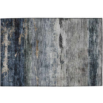 Close-up of the Dalyn Nouveau NV3 Navy Washable Area Rug featuring beige, light blue, and silver gray tones.