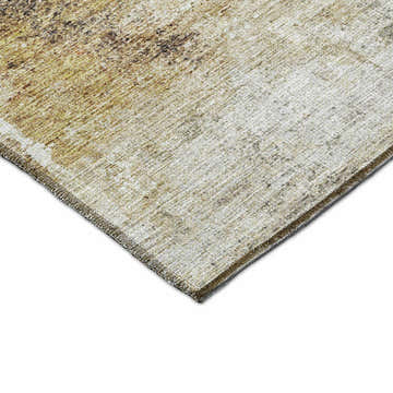 Close-up of the Dalyn Nouveau NV7 Taupe Washable Area Rug showing beige, gold, and ivory tones.