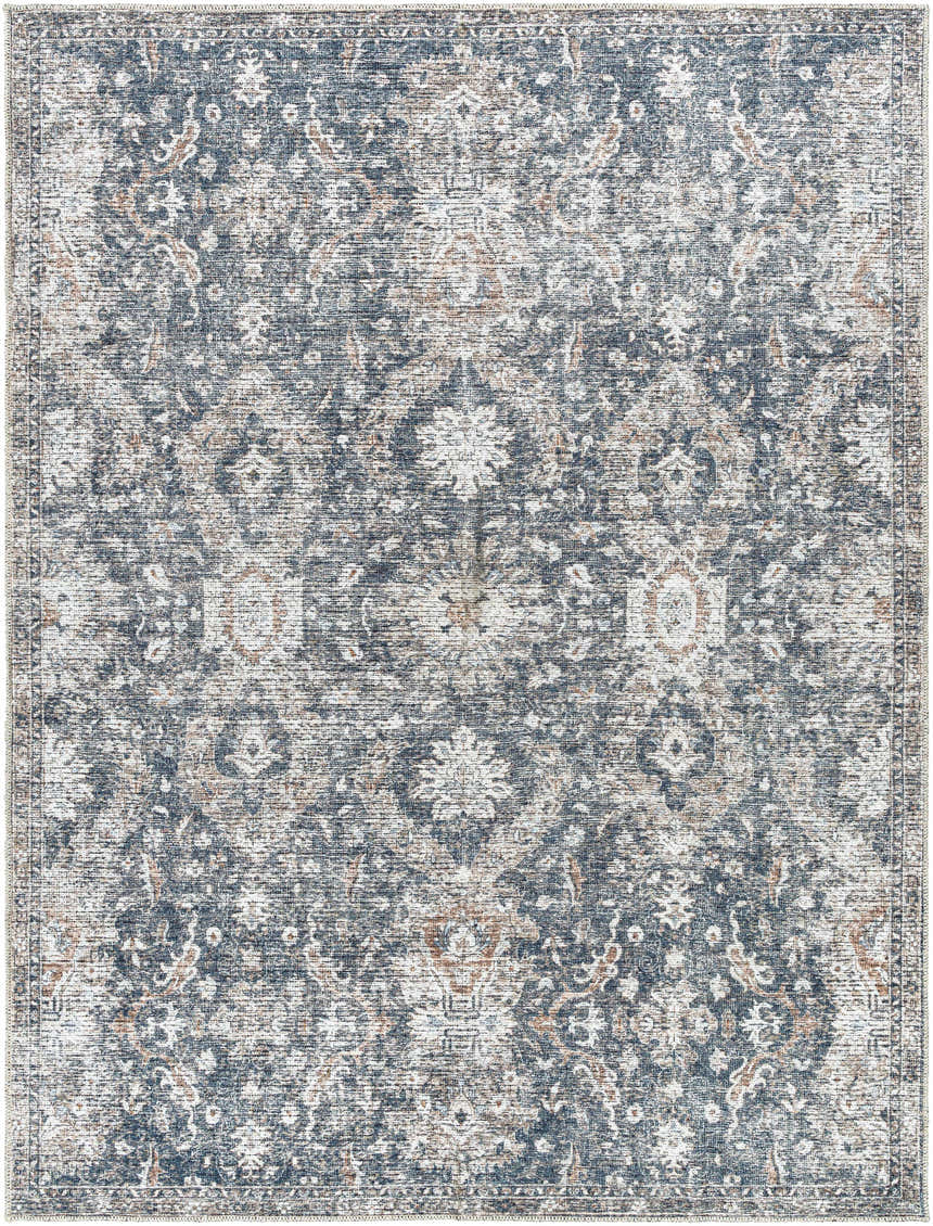 Close-up of the Arnaud Washable Area Rug; a traditional, machine-woven rug in beige, navy, and brown tones. Design-Rectangle-537