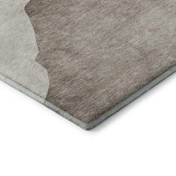 Close-up of the Dalyn Luxury Odyssey OY17 Taupe Washable Area Rug. Shows the rug's texture, taupe and light brown colors.