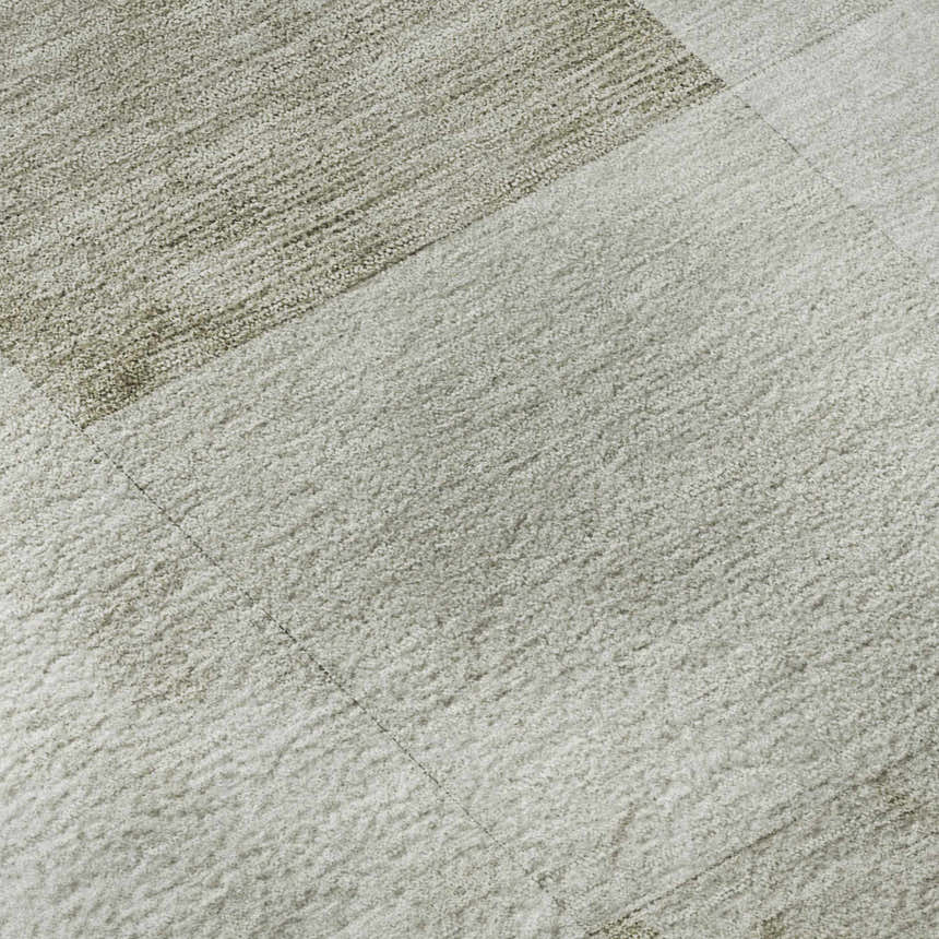 Close-up of the beige Dalyn Pacifica PA10 rug showing its soft texture and subtle pattern. Washable, indoor/outdoor rug.