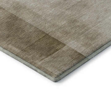 Close-up of the Dalyn Pacifica PA5 Khaki Washable Area Rug. Beige, tan, and chestnut tones with a subtle geometric pattern.