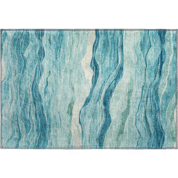Close-up of the Dalyn Pacifica PA6 Turquoise Washable Area Rug. Aqua, teal, and chestnut wavy pattern.