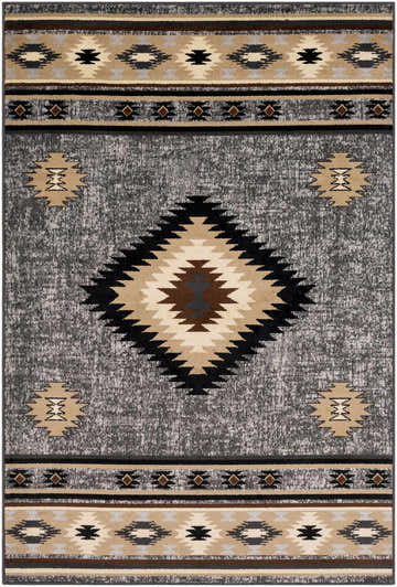 Close-up of the Buckhaven Area Rug. Southwestern design in black, charcoal, beige, and brown. Polypropylene, machine woven texture. Design-Rectangle