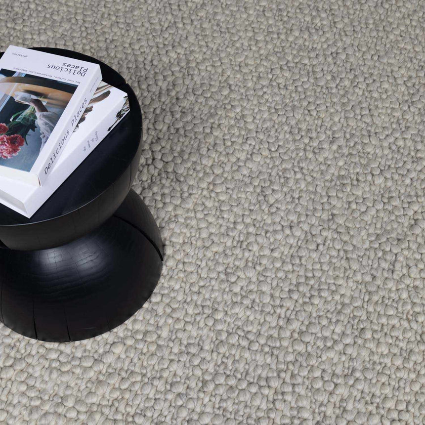 Penmaen Solid Cream Hand-Woven Wool Rug