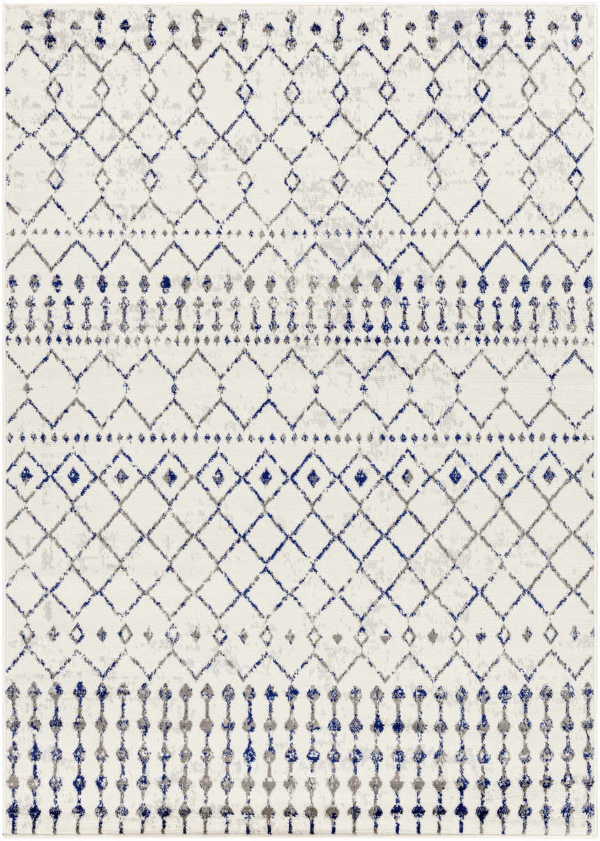 Close-up of the Priel Area Rug, a machine-woven rectangle with a bohemian diamond pattern in blue and gray on a white background. Design-Rectangle-57