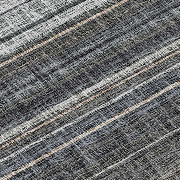 Close-up of the Dalyn Luxury Portico PO2 Chocolate Washable Area Rug. Features a woven texture with beige, brown, and gray stripes.