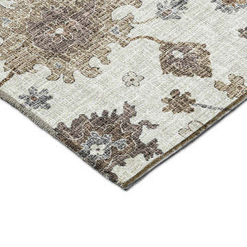 Close-up of Dalyn Luxury Portico PO6 Ivory Washable Area Rug. Farmhouse style rug with chestnut and brown floral pattern.