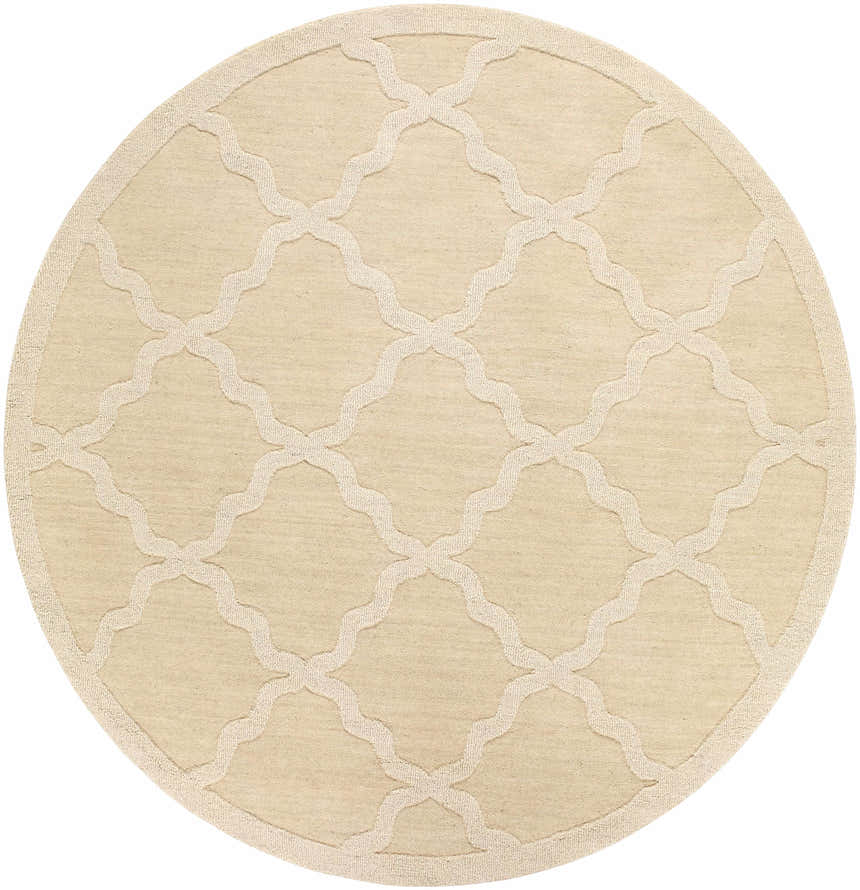 Close-up of the round Posen Area Rug. Tan wool rug with a cream quatrefoil pattern and border. Hand-loomed texture. Design-Round-6