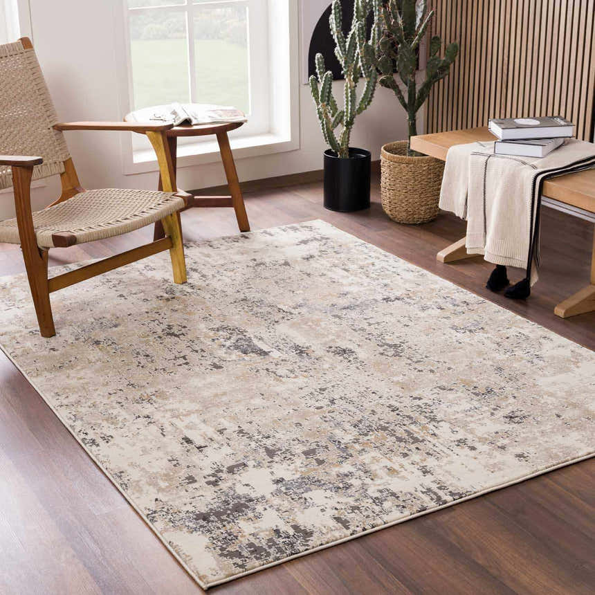 Living room scene with a neutral Pewamo Area Rug, wood furniture, and natural light creating a calm, contemporary mood. Roomscene-Rectangle