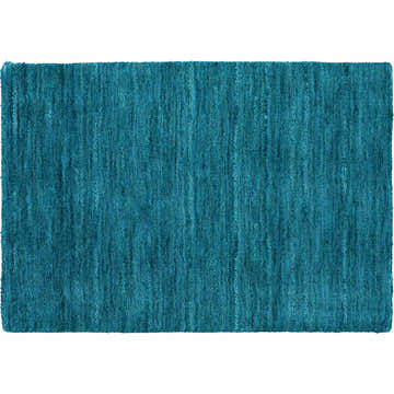 Close-up of the textured Dalyn Rafia RF100 Cobalt area rug in shades of blue and teal. Hand-loomed wool and cotton.