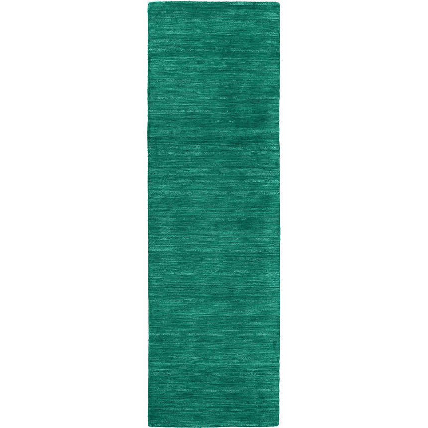 Close-up of the hand-loomed Dalyn Rafia RF100 Emerald Area Rug. Light green wool and cotton rug with subtle texture.