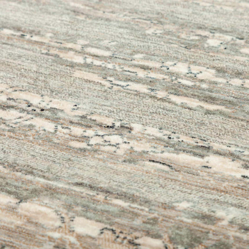 Close-up of Dalyn Regal RG2 Mist Area Rug, showing its blue, chestnut, and ivory farmhouse-style pattern and soft texture.