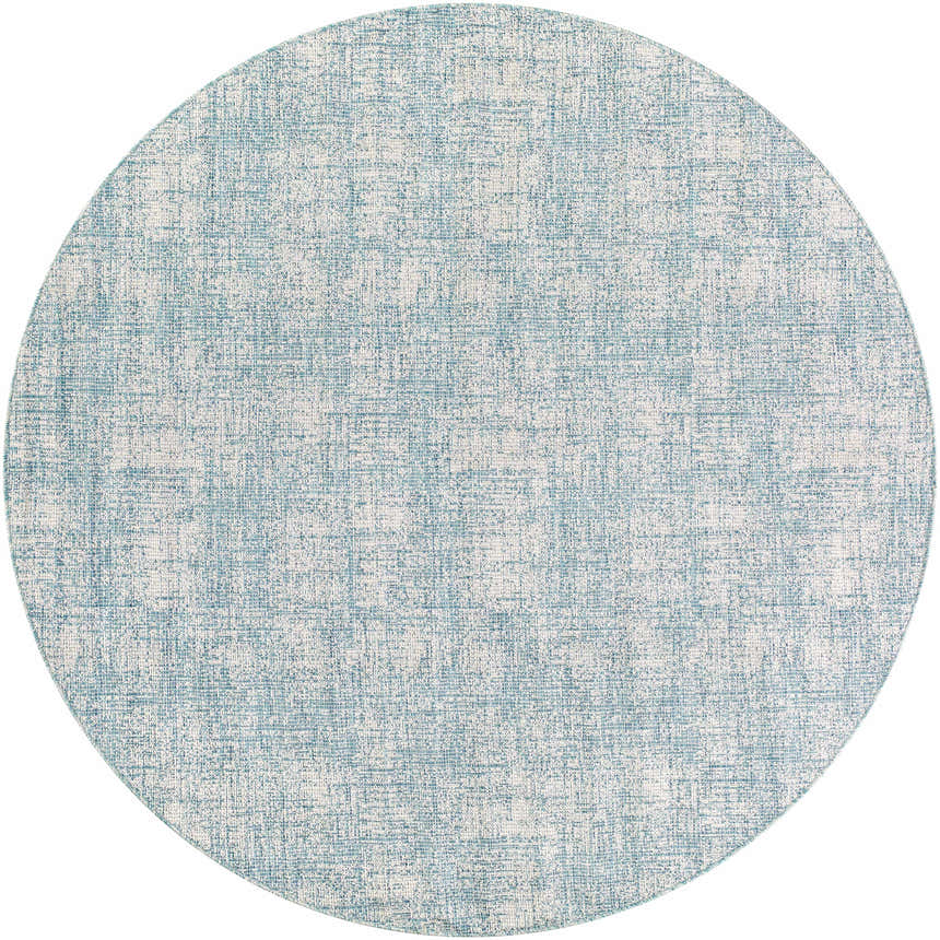 Close-up of round Rhea Area Rug showing denim blue and natural gray woven texture. Contemporary style. Design-Round-7